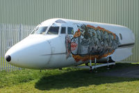 N25AG @ EGBP - outside the ASI hangar painted with some intresting graffiti artwork - by Chris Hall