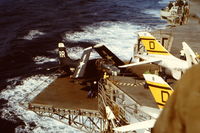 UNKNOWN - A-5 (or is it an A-6) being lifted to the flight deck for take off. - by Daniel Ihde