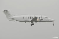 F-HBCG @ EIDW - Photographed landing at Dublin in the rain.