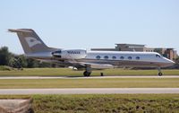 N394AK @ ORL - Gulfstream IV (with a Hawker logo on tail????)