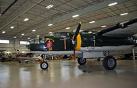 N744CG @ I74 - This beautifully restored airworthy B-25 rests at the Champaign Aviation Museum, showing off her colorful nose art. - by Daniel L. Berek