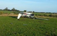 N5944J - N5944J was heavily damaged (destroyed) after making a dead-stick landing in an open field in Dade City, Florida, on 4/27/2013.  The occupants were able to walk away.  The cause remains under investigation (FAA # 2013-A013-N5944J). - by C. Payton