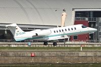D-CLMS @ EGLC - 2009 Learjet 45, c/n: 45-395 departing from London City - by Terry Fletcher