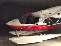 C-IRCK - Plane being switched over to set of new floats. - by Jared Chursinoff