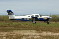 G-GPMW @ EGFH - Visiting Turbo Cherokee Archer IV taxying prior to departure. - by Roger Winser