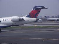 N712EV @ LGA - CRJ JET - by christian maurer