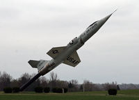 56-0754 @ KFFO - This F-104 is painted to represent 56-0879;the actual aircraft is on display in Karachi, Pakistan.  This airplane serves as a gate guardian at the National Museum of the Air Force, Wright Patterson AFB. - by Daniel L. Berek