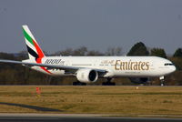 A6-EGO @ EGCC - Emirates 1000th 777 scheme - by Chris Hall