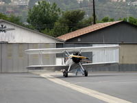 N1702B @ SZP - 1942 Boeing Stearman PT-13D 'Ruthies Doll', Continental W670 220 Hp radial, at hangar ramp-will be displayed today at Aviation Museum of Santa Paula ramp - by Doug Robertson