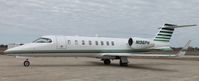 N196PH @ KAXN - Learjet 45 on the ramp. - by Kreg Anderson