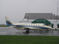 N562TS @ KOSH - Basler FBO ramp