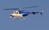 N7QD - Bell 206L-4 LongRanger IV flying over Oakland, CA, on 5/20/2013. - by hugooc