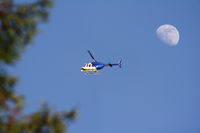 N7QD - A Bell 206L-4 LongRanger IV flying over Oakland, CA. - by hugooc