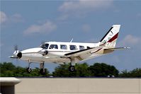 N61470 @ KOSH - Piper PA-31-310 Turbo Navajo B [31-7401262] Oshkosh-Wittman Regional~N 30/07/2008 - by Ray Barber