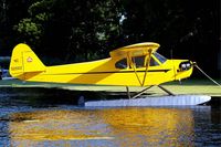 N32562 @ 96WI - N32562   Piper J-3C-65 Cub [5457] Oshkosh-Lake Winnebago Seaplane Base~N 30/07/2008 - by Ray Barber