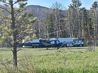 N4582D - Near Commanche Peak, Colorado in May 2013. Maybe being used for deploying lots of hay to free range cows. Not seen in flight, but it had a truck of hay next to it as well as a fuel truck and support trailer. - by Steven Hoober