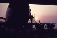 JA8101 @ RJTT - Sunrise at the JAL HND maintenance hangar,May 1971 - by metricbolt