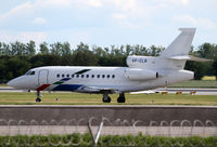 VP-CLB @ LOWW - Volkswagen Air Service Falcon 900 - by Thomas Ranner