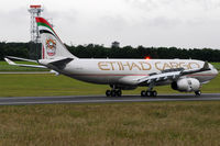A6-DCC @ VIE - Etihad Cargo - by Chris Jilli