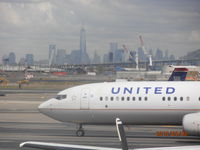 N77431 @ EWR - N77431 Nose with New York skyline in the background - by KeithBHamilton