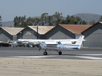 N704JH @ SZP - 1976 Cessna 150M, Continental O-200 100 Hp, landing roll Rwy 22 - by Doug Robertson