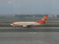 B-2112 @ ZGGG - Taxying by international terminal - shot through dirty glass windows - by magnaman