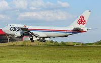 LX-WCV @ ELLX - short final RW06 - by Friedrich Becker