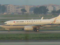 B-5297 @ ZGGG - Bit fuzzy but windows very dirty and had to use camcorder and phone was left at home! - by magnaman