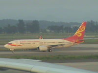 B-5372 @ ZGGG - taxying to take off - seen from stand 107 - by magnaman