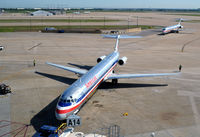 N9627R @ KDFW - Pushback, wing spotters deployed  Gate A14 DFW - by Ronald Barker