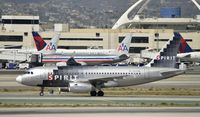 N523NK @ KLAX - Taxiing to gate at LAX - by Todd Royer