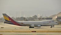 HL7420 @ KLAX - Taxiing to parking at LAX - by Todd Royer