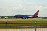 N443WN @ RSW - Landing at RWY 6 - by Mauricio Morro