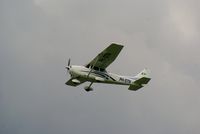 PH-STN @ EHGG - The nice Cessna 172R wanted to land on runway 23 at Eelde, but did not succeed to and started the climb for a missed approach. - by Jorrit de Bruin