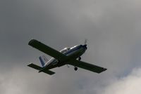 PH-GIS @ EHGG - The skies were cloudy, but the sun broke through these causing a nice effect on the shiny fuselage of the Socata. - by Jorrit de Bruin