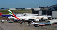A6-EMJ @ KDFW - Gate D11  DFW - by Ronald Barker