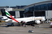 A6-EMJ @ KDFW - Gate D11 DFW - by Ronald Barker