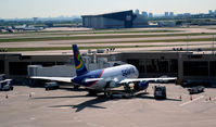 N519NK @ KDFW - Gate E27  DFW - by Ronald Barker