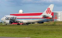 LX-OCV @ ELLX - departure via RW06 - by Friedrich Becker