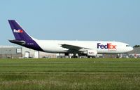 N677FE @ CYOW - Approaching Fedex Terminal just after landing. - by Dirk Fierens