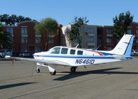N6461D @ CCR - Visitor with airport hotel in the background. - by Bill Larkins