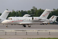 VP-CLZ @ LOWW - Lukoil Avia Bombadier Challenger 601 - by Thomas Ranner
