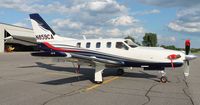 N859CA @ KAXN - Socata TBM-700 on the line. - by Kreg Anderson