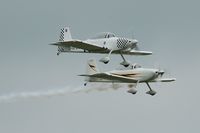 G-VFDS @ EGFH - Resident Vans RV-8 flyby with G-VFDS leading G-EGRV. - by Roger Winser