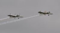 G-EGRV @ EGFH - Resident Vans RV-8's in formation pass with G-EGRV leading G-VFDS. - by Roger Winser