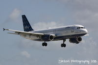 N703JB @ KSRQ - JetBlue Flight 341 (N703JB) It's Up To Blue, New York, New York arrives on Runway 14 at Sarasota-Bradenton International Airport following a flight from John F Kennedy International Airport - by Donten Photography