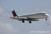 N908DE @ KSRQ - Delta Flight 2298 (N908DE) arrives on Runway 14 at Sarasota-Bradenton International Airport following a flight from Hartsfield-Jackson Atlanta International Airport - by Donten Photography