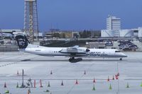 N446QX @ KLAX - Alaska Airlines (Horizon Airlines) Bombardier Dash 8 taxiing passed the new Tom Bradley International Terminal on LAX Appreciation Day.