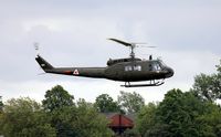 G-HUEY @ EGSX - Ex: 73-22077 > Argentine Air Force AE-413> G-HUEY - Originally owned to, Royal Air Force Benevolent Fund in July 1985 and currently with, MX Jets Ltd since April 2011