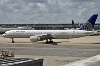 N526UA @ KIAD - Taxiing to parking after arrival - by Robert Kearney